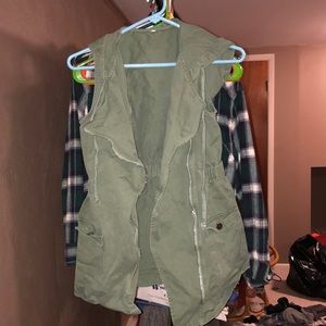 Asymmetrical zip up green vest